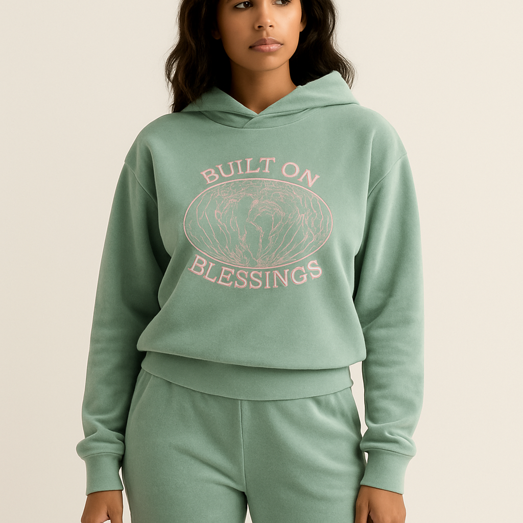 - brand name is still pending, but the vision is street wear / luxury. trying to keep it classy but cool. since it’s winter, i want to create some tracksuits, preferably pastel colours of all sorts. i like the strait pants with a tighter hoodie. i want the logo to be embroided saying “Built On Blessings” and the the words overlapping an outline of the world map or globe in pink embroiderey
- modern sans-serif with a better fit for every body type, detailed world map would be more intricate & eye catching for certain! lets try the pastel sage first, mauve next & the rest of options you prices fillings. tracksuit mockup would be preferred, perhaps an asymmetrical v cut pant and top velour material for women 
- brand name is still pending, but the vision is street wear / luxury. trying to keep it classy but cool. since it’s winter, i want to create some tracksuits, preferably pastel colours of all sorts. i like the strait pants with a tighter hoodie. i want the logo to be embroided saying “Built On Blessings” and the the words overlapping an outline of the world map or globe in pink embroiderey
- modern sans-serif with a better fit for every body type, detailed world map would be more intricate & eye catching for certain! lets try the pastel sage first, mauve next & the rest of options you prices fillings. tracksuit mockup would be preferred, perhaps an asymmetrical v cut pant and top velour material for women