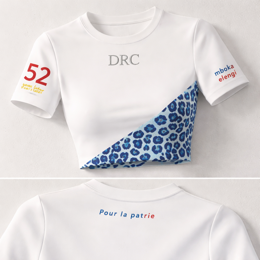 High-end fashion design of a white fitted crop top, body-hugging and modern. Add an asymmetrical leopard print pattern only at the bottom on one side, slightly rising diagonally. The leopard print must be in shades of blue and light blue instead of classic colors. Keep the rest of the top clean white. On the upper chest, add “DRC” in a clean elegant font.
On the sleeve on the leopard side, write “52 years later” with “52” large and bold, and “years later” smaller. Use red for “52” and yellow for “years later”.
On the opposite sleeve, write “mboka elengi” in small minimalist letters using blue, yellow, and red colors inspired by the DRC flag.
Add “Pour la patrie” on the back, very minimal and not too large, placed slightly above and below the collar area (not directly on the collar), using colors inspired by the DRC flag.
High-end fashion design of a white fitted crop top, body-hugging and modern. Add an asymmetrical leopard print pattern only at the bottom on one side, slightly rising diagonally. The leopard print must be in shades of blue and light blue instead of classic colors. Keep the rest of the top clean white. On the upper chest, add “DRC” in a clean elegant font.
On the sleeve on the leopard side, write “52 years later” with “52” large and bold, and “years later” smaller. Use red for “52” and yellow for “years later”.
On the opposite sleeve, write “mboka elengi” in small minimalist letters using blue, yellow, and red colors inspired by the DRC flag.
Add “Pour la patrie” on the back, very minimal and not too large, placed slightly above and below the collar area (not directly on the collar), using colors inspired by the DRC flag.