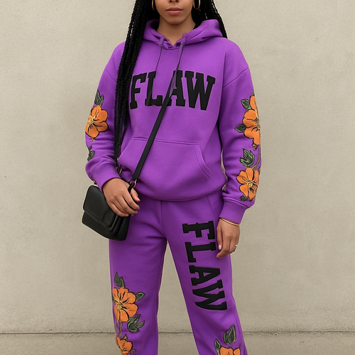 Purple jogging suit hoodie with bold words Flaw in abbreviation on it in Black braids gold hoop earrings and gold bracelet flowers on the sleeves and pants Flaw going down on the pants Black cross body purse and black nike shoes 