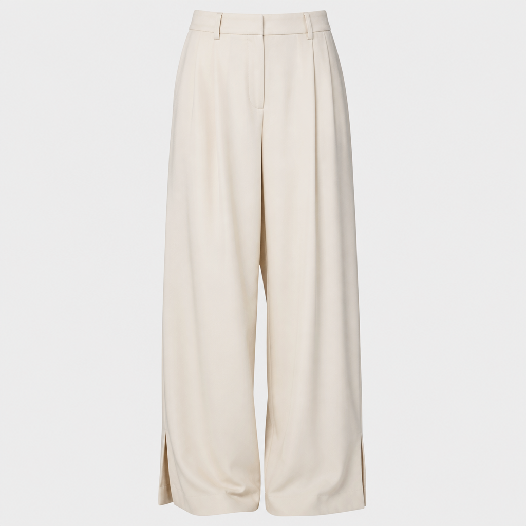 baggy cream pants with slight slit
photorealistic fashion design, baggy cream pants with slight slit, just the design no text