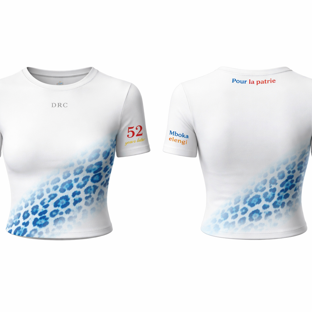 High-end fashion design of a white fitted crop top, body-hugging and modern. Add an asymmetrical leopard print pattern only at the bottom on one side, slightly rising diagonally. The leopard print must be in shades of blue and light blue. The pattern should not have harsh edges or sharp outlines; instead, it should look blended into the fabric, with soft, slightly blurred edges and a faded effect, as if the print is infused into the material. The spots should gradually fade out toward the edges, creating a smooth transition into the white fabric.
Keep the rest of the top clean white. On the upper chest, add “DRC” in a clean elegant font.
On the sleeve on the leopard side, write “52 years later” with “52” large and bold in red, and “years later” smaller in yellow.
On the opposite sleeve, write “Mboka elengi” in small minimalist letters using blue, red, and yellow colors.
Add “Pour la patrie” on the back, very minimal, placed slightly above and below the collar (not directly on the collar), using blue, red, and yellow colors.
Style: luxury streetwear, minimalist, cultural identity, clean, soft blended textures, realistic fabric, high-quality fashion mockup, front and back view.
High-end fashion design of a white fitted crop top, body-hugging and modern. Add an asymmetrical leopard print pattern only at the bottom on one side, slightly rising diagonally. The leopard print must be in shades of blue and light blue. The pattern should not have harsh edges or sharp outlines; instead, it should look blended into the fabric, with soft, slightly blurred edges and a faded effect, as if the print is infused into the material. The spots should gradually fade out toward the edges, creating a smooth transition into the white fabric.
Keep the rest of the top clean white. On the upper chest, add “DRC” in a clean elegant font.
On the sleeve on the leopard side, write “52 years later” with “52” large and bold in red, and “years later” smaller in yellow.
On the opposite sleeve, write “Mboka elengi” in small minimalist letters using blue, red, and yellow colors.
Add “Pour la patrie” on the back, very minimal, placed slightly above and below the collar (not directly on the collar), using blue, red, and yellow colors.
Style: luxury streetwear, minimalist, cultural identity, clean, soft blended textures, realistic fabric, high-quality fashion mockup, front and back view.