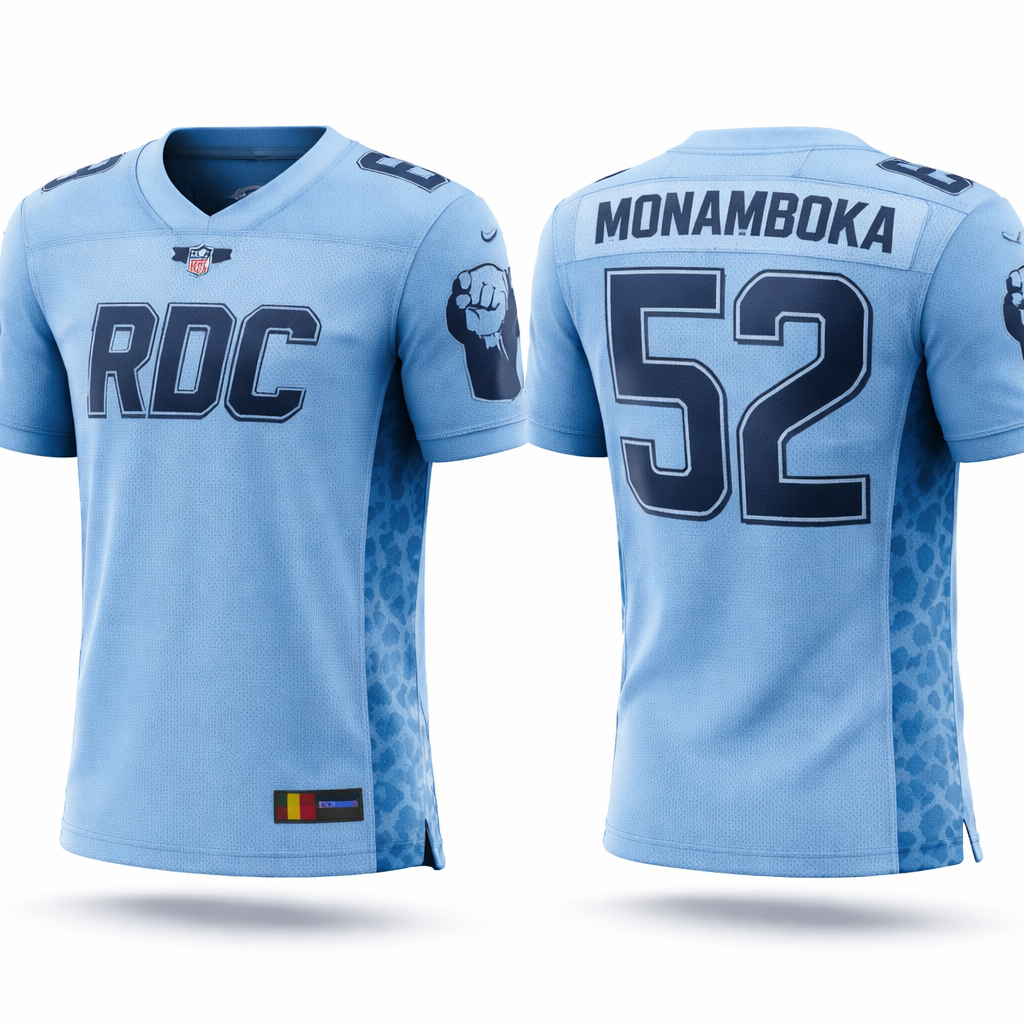 Ultra-realistic men’s American football jersey inspired by NFL style. Light blue breathable mesh fabric, realistic stitching and sports texture.
Front is clean with only “RDC” on the chest in dark blue athletic font. No number on the front.
Back has “MONAMBOKA” in large curved letters and a big “52” below it in dark blue.
One sleeve has a minimal abstract silhouette of Patrice Lumumba with raised hand (icon style, not detailed drawing).
One side of the jersey has a subtle blue leopard texture blended into the fabric (not a drawing, more like fabric pattern).
Small DRC flag detail in red, blue, yellow placed subtly on the jersey.
Style: clean, premium sportswear, realistic NFL jersey, minimal but powerful design, high detail fabric texture.
Ultra-realistic men’s American football jersey inspired by NFL style. Light blue breathable mesh fabric, realistic stitching and sports texture.
Front is clean with only “RDC” on the chest in dark blue athletic font. No number on the front.
Back has “MONAMBOKA” in large curved letters and a big “52” below it in dark blue.
One sleeve has a minimal abstract silhouette of Patrice Lumumba with raised hand (icon style, not detailed drawing).
One side of the jersey has a subtle blue leopard texture blended into the fabric (not a drawing, more like fabric pattern).
Small DRC flag detail in red, blue, yellow placed subtly on the jersey.
Style: clean, premium sportswear, realistic NFL jersey, minimal but powerful design, high detail fabric texture.
