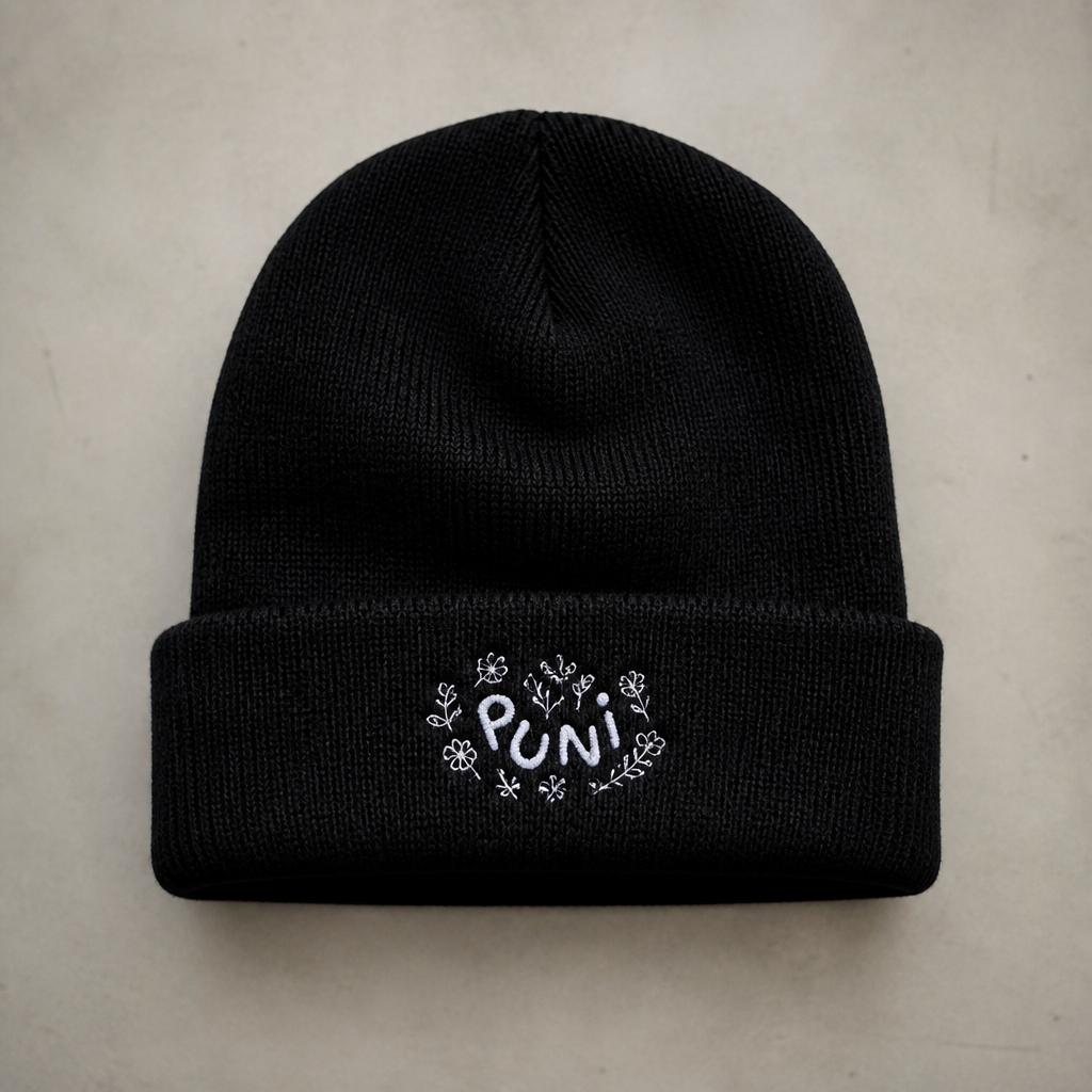 Create a premium black knitted beanie for an independent streetwear fashion brand called PUNI.
The beanie should have a soft, slightly slouchy fit with realistic knitted texture and a clean, high-quality finish.
FRONT DESIGN
Place a small custom PUNI logo on the front of the beanie.
The word PUNI must NOT look like ordinary typed text or a corporate logo. Create custom lettering with soft rounded shapes, slightly curved/wavy positioning, playful bends, and subtle hand-drawn imperfections. The lettering should feel artistic, youthful, and intentionally designed.
Surround the PUNI lettering with tiny hand-drawn white flowers and delicate botanical details. The flowers should be organic and slightly imperfect, with different small flower shapes, tiny petals, and subtle curved stems.
Keep the graphic small and understated, centered on the front of the beanie. Do not make it oversized.
STYLE
Black knitted beanie with white PUNI artwork.
The design should feel:
- soft streetwear
- feminine but edgy
- mysterious
- playful
- artistic
- youthful
- premium
- slightly vintage
- independent designer brand
Avoid corporate branding, generic typography, perfect geometric flowers, oversized graphics, or childish cartoon artwork.
The beanie should look like a real retail fashion accessory from the same PUNI collection as a black fitted long-sleeve top and white cargo skirt, while still working as a standalone signature piece.
Create a realistic high-end fashion product mockup, front-facing view, detailed knitted fabric texture, clean studio presentation.. Nigeria fashion aesthetics. Present it as professional fashion catalogue photography: the garment is the subject, shown full-length with editorial styling, neutral posing and tasteful, non-suggestive framing.
photorealistic fashion design, Create a premium black knitted beanie for an independent streetwear fashion brand called PUNI.
The beanie should have a soft, slightly slouchy fit with realistic knitted texture and a clean, high-quality finish.
FRONT DESIGN
Place a small custom PUNI logo on the front of the beanie.
The word PUNI must NOT look like ordinary typed text or a corporate logo. Create custom lettering with soft rounded shapes, slightly curved/wavy positioning, playful bends, and subtle hand-drawn imperfections. The lettering should feel artistic, youthful, and intentionally designed.
Surround the PUNI lettering with tiny hand-drawn white flowers and delicate botanical details. The flowers should be organic and slightly imperfect, with different small flower shapes, tiny petals, and subtle curved stems.
Keep the graphic small and understated, centered on the front of the beanie. Do not make it oversized.
STYLE
Black knitted beanie with white PUNI artwork.
The design should feel:
- soft streetwear
- feminine but edgy
- mysterious
- playful
- artistic
- youthful
- premium
- slightly vintage
- independent designer brand
Avoid corporate branding, generic typography, perfect geometric flowers, oversized graphics, or childish cartoon artwork.
The beanie should look like a real retail fashion accessory from the same PUNI collection as a black fitted long-sleeve top and white cargo skirt, while still working as a standalone signature piece.
Create a realistic high-end fashion product mockup, front-facing view, detailed knitted fabric texture, clean studio presentation.. Nigeria fashion aesthetics. Present it as professional fashion catalogue photography: the garment is the subject, shown full-length with editorial styling, neutral posing and tasteful, non-suggestive framing., just the design no text
