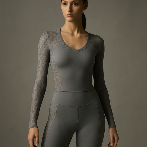 Luxury grey pearl activewear outfit made of high-performance sculpting material with refined lace details along the sleeves, sides, and neckline. Combination of elegance and motion. Studio neutral background, cinematic lighting, focus on texture contrast (mat vs transparent), ultra-detailed 8K fabric rendering, sporty yet couture aesthetic, Lauren Secret Collection.