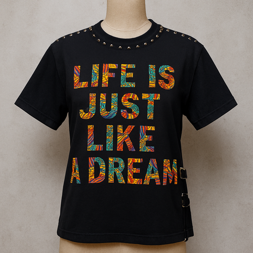 A one of a kind beautiful different plain color T -shirt that stands out, which will have written words on it with Ankara fabrics such as “life is just like a dream” front and back pose on a mannequin. 