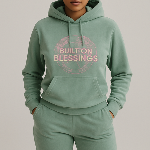 brand name “The Modest Fleur,” but the vision is street wear / luxury. trying to keep modest ,classy but cool. since it's winter, i want to create some tracksuits, preferably pastel colours of all sorts. i like the strait pants with a tighter hoodie. i want the logo to be embroided saying "Built On Blessings" and the the words overlapping an outline of the world map or globe in pink embroiderey, modern sans-serif with a better fit for every body type, detailed world map would be more intricate & eye catching for certain! lets try the pastel sage first, mauve next & the rest of options you prices fillings. tracksuit mockup would be preferred, perhaps an asymmetrical pant and top velour material for women