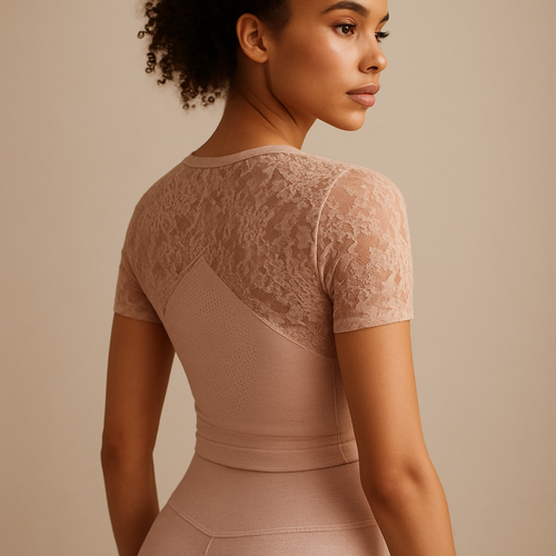 Luxury nude pink lace sportswear outfit, combining soft technical fabric and high-end lace transparency on shoulders and back. Delicate, feminine, yet functional. Premium studio editorial, soft light, focus on texture transitions, ultra-detailed materials, elegant athletic woman with natural curly hair, Lauren Secret fashion campaign.