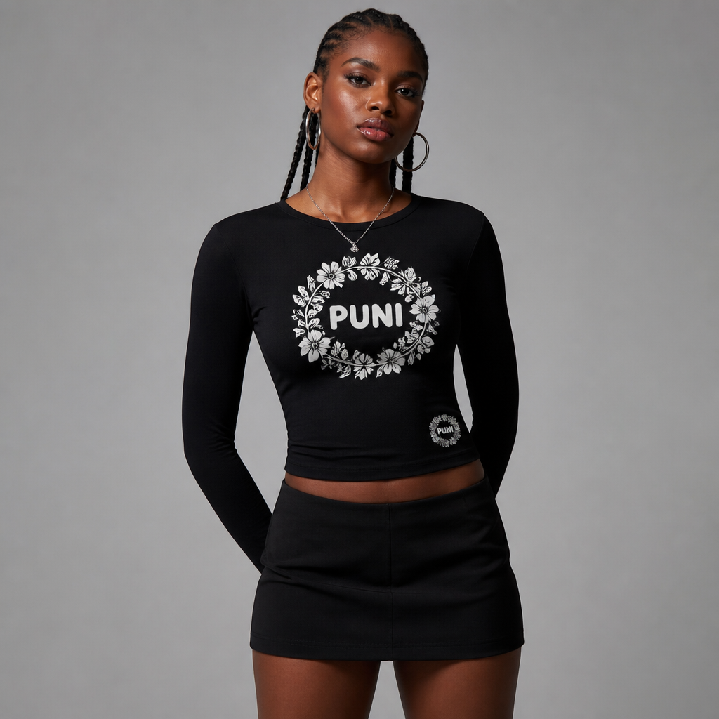 A Female Dress design, suitable for Summer. Create a premium streetwear fashion design of a black fitted long-sleeve baby tee with a clean, feminine, slightly cropped silhouette.
CENTER CHEST DESIGN
Place the word “PUNI” clearly in the center of the chest in bold, soft, rounded white lettering.
Surround the PUNI lettering with a circular floral arrangement. The flowers should form a rounded frame around the word PUNI, almost like the flowers are naturally growing around and partially embracing the lettering. Use multiple small and medium white flowers, petals, leaves, and delicate botanical details to create a full but elegant floral circle.
The PUNI lettering must remain clearly visible in the middle. The floral frame should feel artistic and slightly imperfect rather than perfectly symmetrical. It should look like a signature graphic for a real independent streetwear brand.
WAIST DETAIL
Around the lower waist area, add a much smaller miniature version of the same PUNI floral-circle design. Make it subtle and delicate, repeating the visual language of the chest graphic without competing with it.
The waist motif should be noticeably smaller than the chest design and can appear slightly offset or wrap subtly around the lower torso.
COLOR & STYLE
- Black fitted shirt
- White PUNI lettering
- White flowers and botanical details
- No other colors
- Clean black fabric
- Crisp screen-print/embroidered graphic appearance
- Minimal everywhere else
Overall aesthetic: soft streetwear + feminine + mysterious + slightly edgy + cute but sophisticated + premium fashion label. The design should feel distinctive and memorable, like something people would see and immediately wonder what brand it is.
Show the complete shirt from the front as a realistic high-end fashion product concept, with accurate garment proportions, realistic fabric texture, clean studio presentation.. Nigeria fashion aesthetics. Present it as professional fashion catalogue photography: the garment is the subject, shown full-length with editorial styling, neutral posing and tasteful, non-suggestive framing.
photorealistic fashion design, A Female Dress design, suitable for Summer. Create a premium streetwear fashion design of a black fitted long-sleeve baby tee with a clean, feminine, slightly cropped silhouette.
CENTER CHEST DESIGN
Place the word “PUNI” clearly in the center of the chest in bold, soft, rounded white lettering.
Surround the PUNI lettering with a circular floral arrangement. The flowers should form a rounded frame around the word PUNI, almost like the flowers are naturally growing around and partially embracing the lettering. Use multiple small and medium white flowers, petals, leaves, and delicate botanical details to create a full but elegant floral circle.
The PUNI lettering must remain clearly visible in the middle. The floral frame should feel artistic and slightly imperfect rather than perfectly symmetrical. It should look like a signature graphic for a real independent streetwear brand.
WAIST DETAIL
Around the lower waist area, add a much smaller miniature version of the same PUNI floral-circle design. Make it subtle and delicate, repeating the visual language of the chest graphic without competing with it.
The waist motif should be noticeably smaller than the chest design and can appear slightly offset or wrap subtly around the lower torso.
COLOR & STYLE
- Black fitted shirt
- White PUNI lettering
- White flowers and botanical details
- No other colors
- Clean black fabric
- Crisp screen-print/embroidered graphic appearance
- Minimal everywhere else
Overall aesthetic: soft streetwear + feminine + mysterious + slightly edgy + cute but sophisticated + premium fashion label. The design should feel distinctive and memorable, like something people would see and immediately wonder what brand it is.
Show the complete shirt from the front as a realistic high-end fashion product concept, with accurate garment proportions, realistic fabric texture, clean studio presentation.. Nigeria fashion aesthetics. Present it as professional fashion catalogue photography: the garment is the subject, shown full-length with editorial styling, neutral posing and tasteful, non-suggestive framing., just the design no text