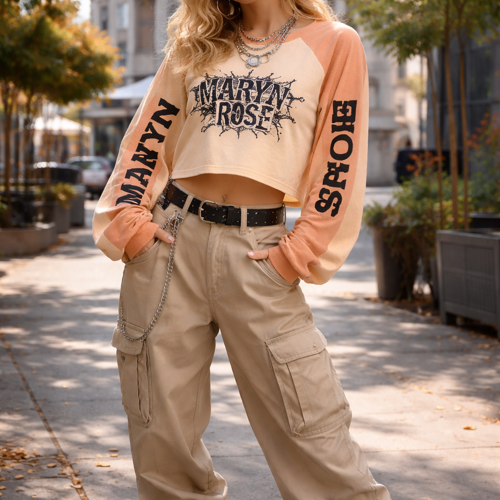 long sleeve top with “maryn” on one sleeve and “rose” on the other. too itself is champagne and muted peach paired with some baggy gen z styled carpenter pants. band logo punk rock logo visible on front of top. nike air force ones. very maryn rose aesthetic.
long sleeve top with “maryn” on one sleeve and “rose” on the other. too itself is champagne and muted peach paired with some baggy gen z styled carpenter pants. band logo punk rock logo visible on front of top. nike air force ones. very maryn rose aesthetic. , artsy style