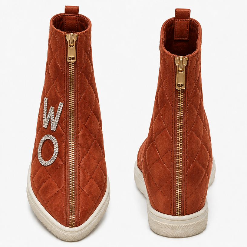 Make the same sneaker in rust quilted suede with the two letter in rhinestone w and o on the right hand side in the front of the sneaker
edit the attached fashion design with these instructions: Make the same sneaker in rust quilted suede with the two letter in rhinestone w and o on the right hand side in the front of the sneaker. keep it photorealistic, just the design no text