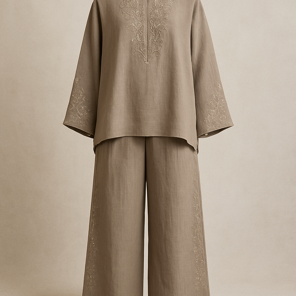 A pioneering two-piece modest ensemble crafted from premium linen — featuring fluid, loose-cut pants and an elegant relaxed top, elevated with refined embroidery and delicate stone detailing. Designed in minimalist, sophisticated hues, it delivers a rich, chic aesthetic that feels unmistakably unique and first of its kind. Make them breathable and stylish hands
A pioneering two-piece modest ensemble crafted from premium linen — featuring fluid, loose-cut pants and an elegant relaxed top, elevated with refined embroidery and delicate stone detailing. Designed in minimalist, sophisticated hues, it delivers a rich, chic aesthetic that feels unmistakably unique and first of its kind. Make them breathable and stylish hands