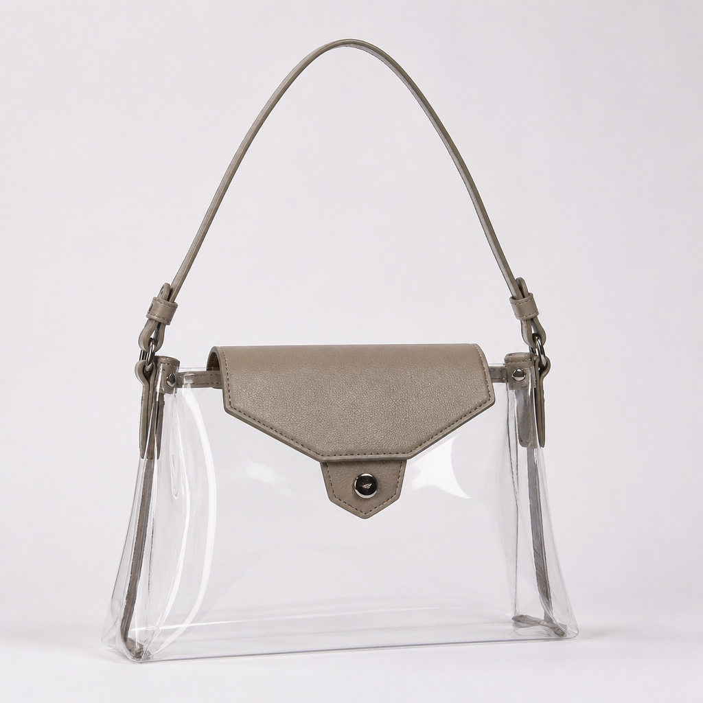 Creat a longchamp style clear bag but make it a little different to make it my own have it no larger than 12 x 6 x 12 and make it one single strap I like that but change the flap to be more geometric
photorealistic fashion design, Creat a longchamp style clear bag but make it a little different to make it my own have it no larger than 12 x 6 x 12 and make it one single strap I like that but change the flap to be more geometric, classic style, just the design no text