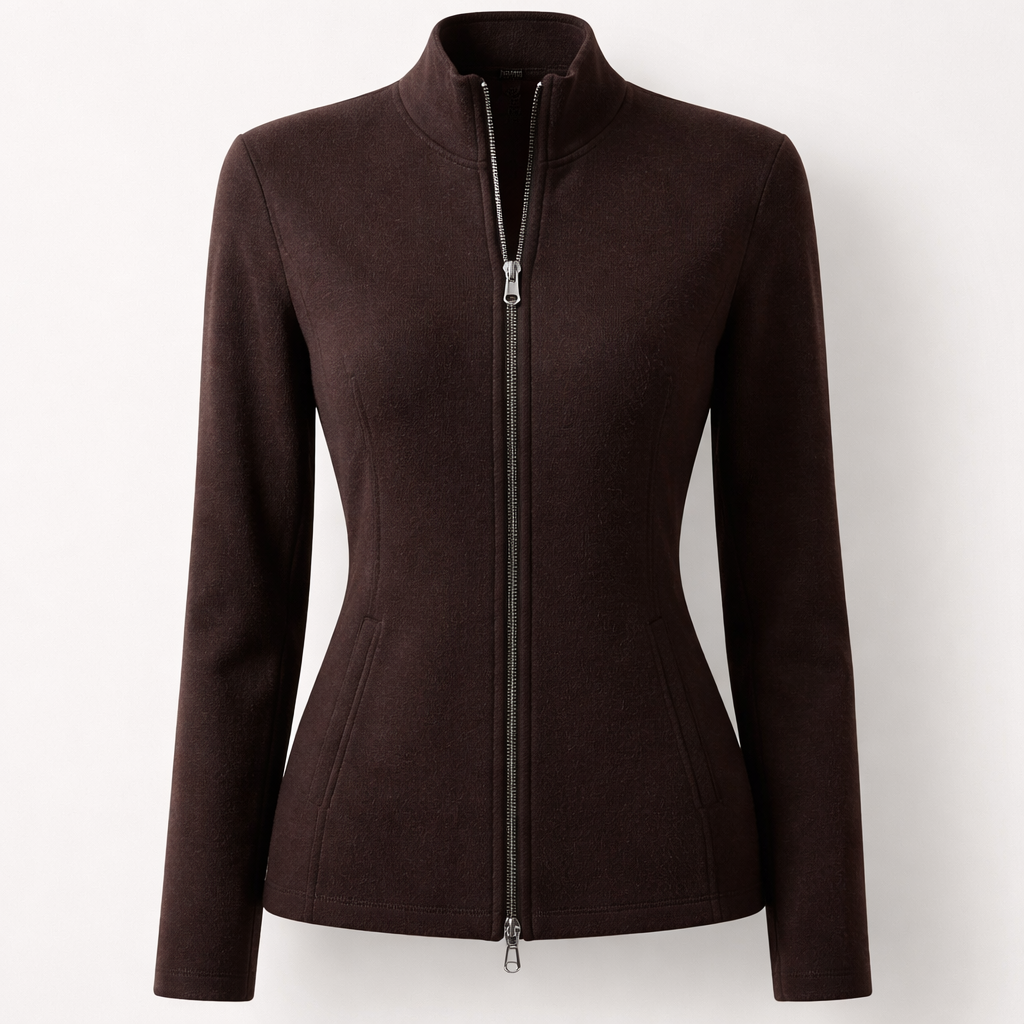 “Design a dark brown zip-up jacket for women, made from soft, smooth fabric suitable for fall and winter. The jacket should feel premium and polished on the outside, giving a neat and structured appearance. It features a silver zipper with a small ‘f’ shaped pull and is styled open. The overall design is feminine, minimal, elegant, and sophisticated, combining warmth, comfort, and a high-end athleisure aesthetic.”
Design a women's dark brown zip-up jacket in a fitted silhouette. Use soft, smooth wool knit fabric. It has a straight cut, a silver zipper with an 'f' pull, and no pattern. The jacket feels premium, minimal, and sophisticated for fall and winter.