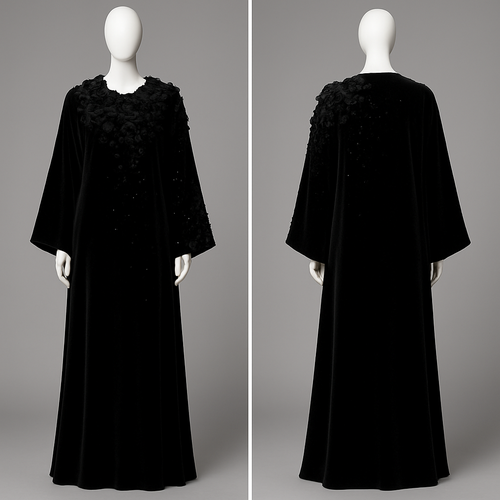 The Velvet Midnight Bloom Abaya
Tone: Deep velvet black
Fabric: Heavy velvet–crepe blend
Design:
A dense cluster of 3D velvet flowers around the neckline flowing softly across one sleeve.
Embellishment:
Black Swarovski stones scattered like stars.
Vibe:
Royal, powerful, and irresistibly classy.