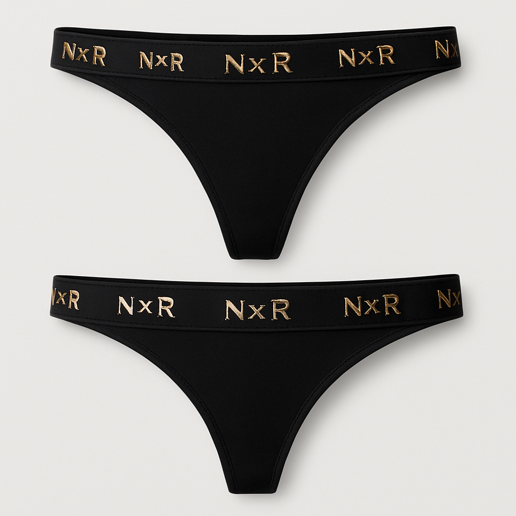 🖤 N x R – Trusse Design (produktillustration vejledning)
Form:
• Klassisk tanga/string med smal hofteelastik.
• Let V-form foran og smallere bagpå.
Materiale:
• Sort, mat mikrofiber eller satinblød nylon/spandex-blanding.
• Bløde sømme med diskret glans.
Farver:
• Base: dyb sort (#0A0A0A)
• Detaljer & logo: børstet guld (#D4AF37)
Elastik/linning:
• 2 cm bred, sort elastik.
• Løber hele vejen rundt med gentaget “N x R”-logo i guld.
• Logoet trykkes med let metallic finish.
Logo-placering:
• Hovedlogo midt foran.
• Små gentagelser af “N x R” hele vejen rundt i linningen.
Finish:
• Inderside foret med blødt, åndbart stof.
• Lille sort label på indersiden med guldtekst “Made in Denmark”.
Make ik look like a sexy g string
🖤 N x R – Trusse Design (produktillustration vejledning)
Form:
• Klassisk tanga/string med smal hofteelastik.
• Let V-form foran og smallere bagpå.
Materiale:
• Sort, mat mikrofiber eller satinblød nylon/spandex-blanding.
• Bløde sømme med diskret glans.
Farver:
• Base: dyb sort (#0A0A0A)
• Detaljer & logo: børstet guld (#D4AF37)
Elastik/linning:
• 2 cm bred, sort elastik.
• Løber hele vejen rundt med gentaget “N x R”-logo i guld.
• Logoet trykkes med let metallic finish.
Logo-placering:
• Hovedlogo midt foran.
• Små gentagelser af “N x R” hele vejen rundt i linningen.
Finish:
• Inderside foret med blødt, åndbart stof.
• Lille sort label på indersiden med guldtekst “Made in Denmark”.
Make ik look like a sexy g string , casual style, show front and back